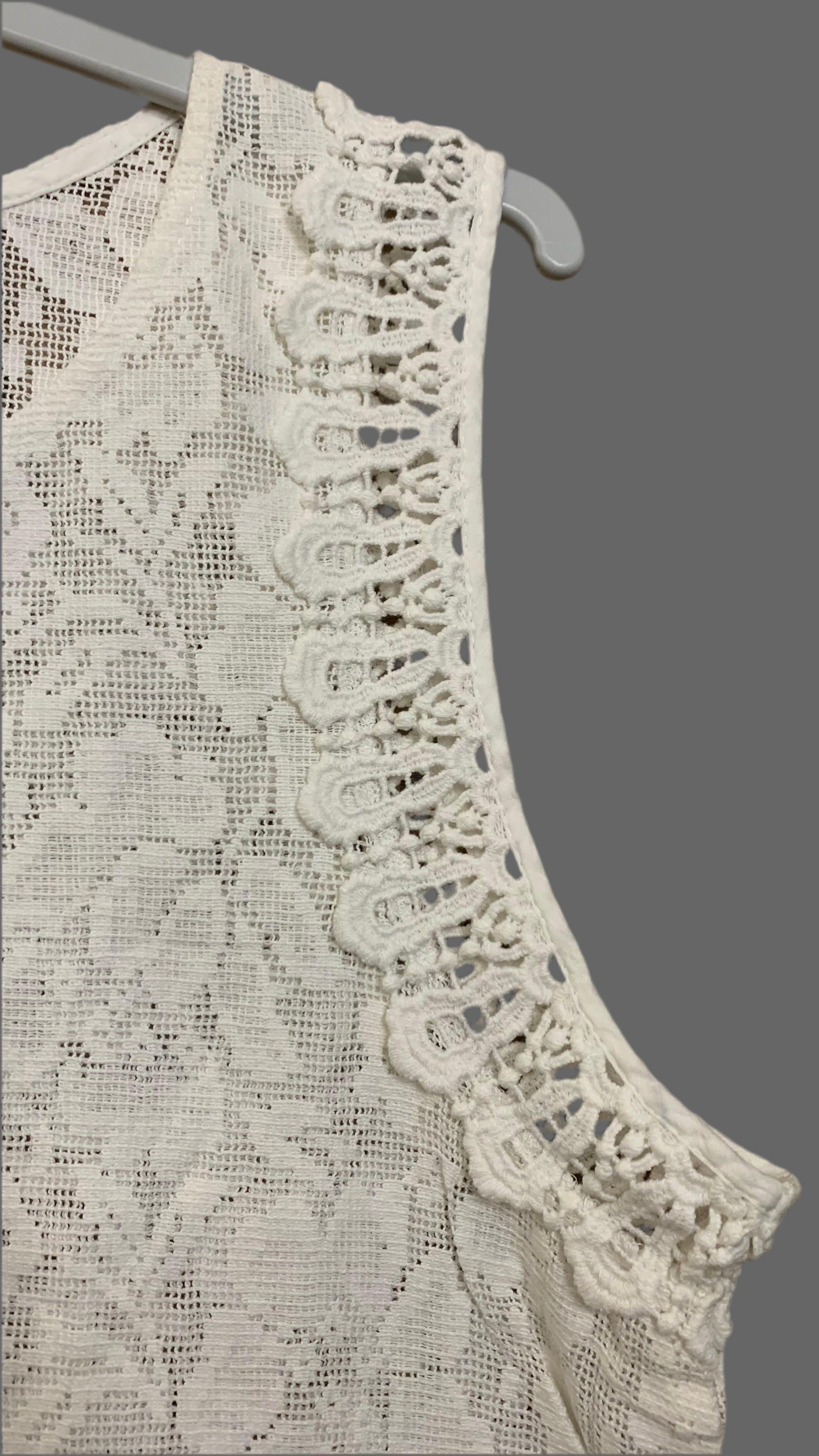 Blouse sans manches en dentelle