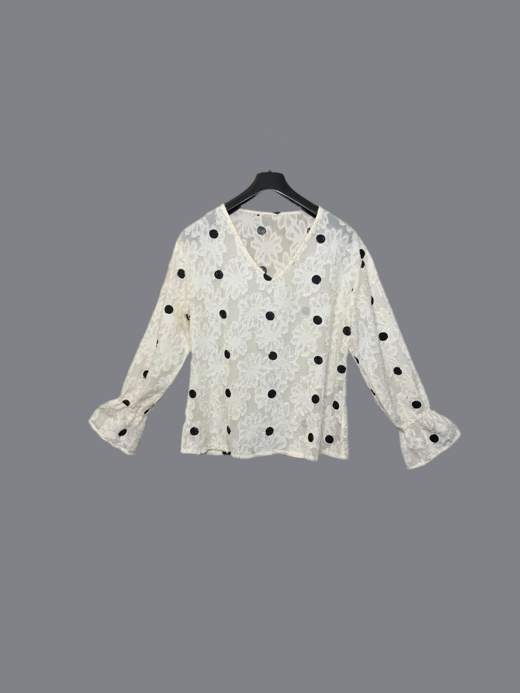 Blouse blanche à pois noirs brodés
