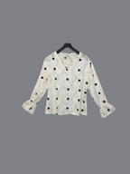 Blouse blanche à pois noirs brodés