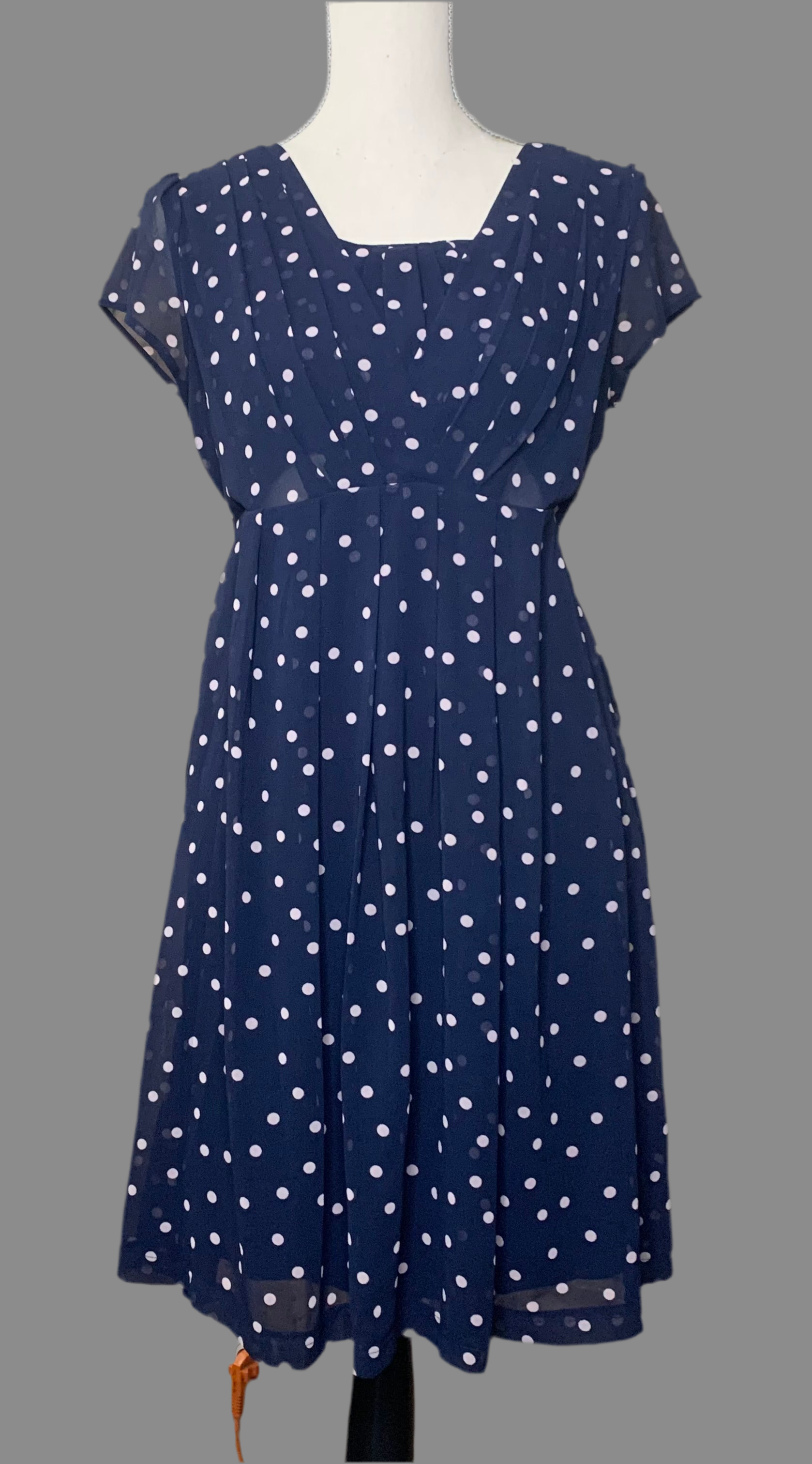 Robe bleu marine à pois roses – Séraphine