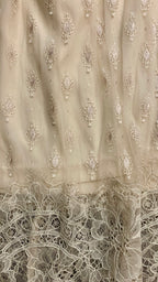 Jupe mi-longue en dentelle écrue – H&M