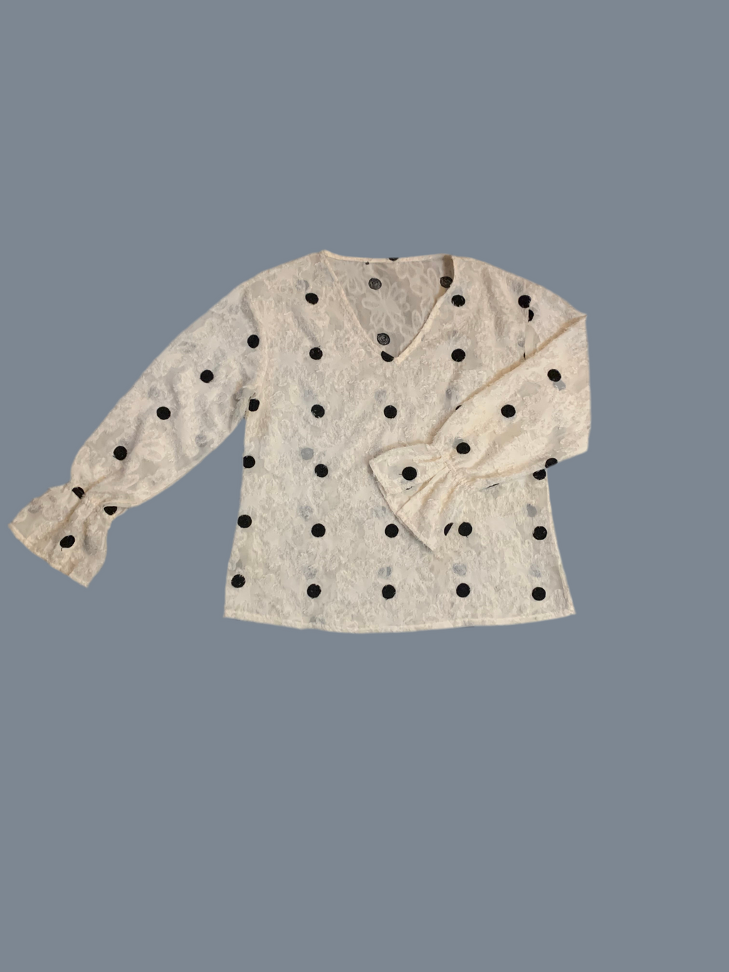 Blouse blanche à pois noirs brodés