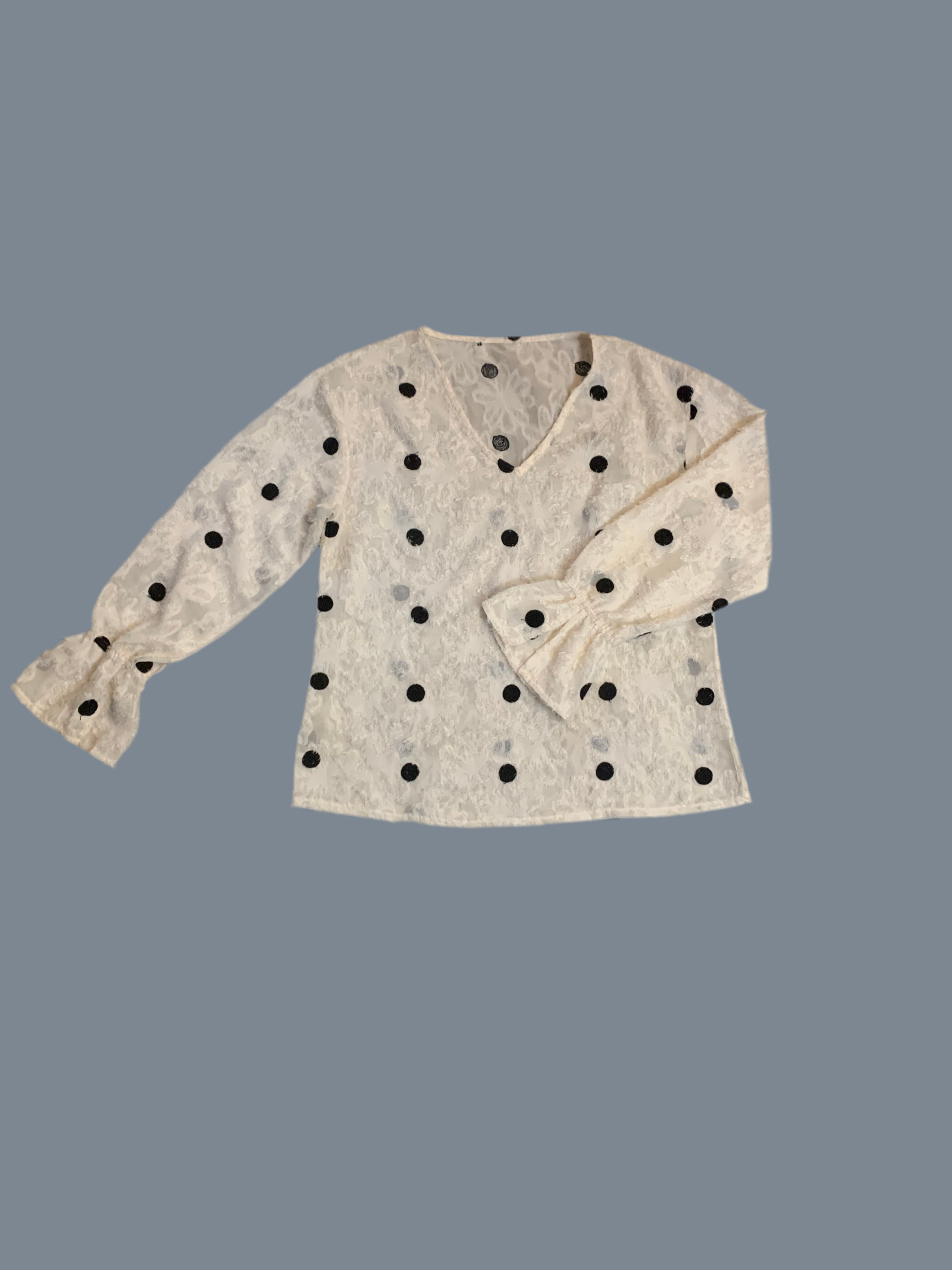 Blouse blanche à pois noirs brodés
