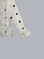 Blouse blanche à pois noirs brodés