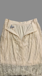 Jupe mi-longue en dentelle écrue – H&M
