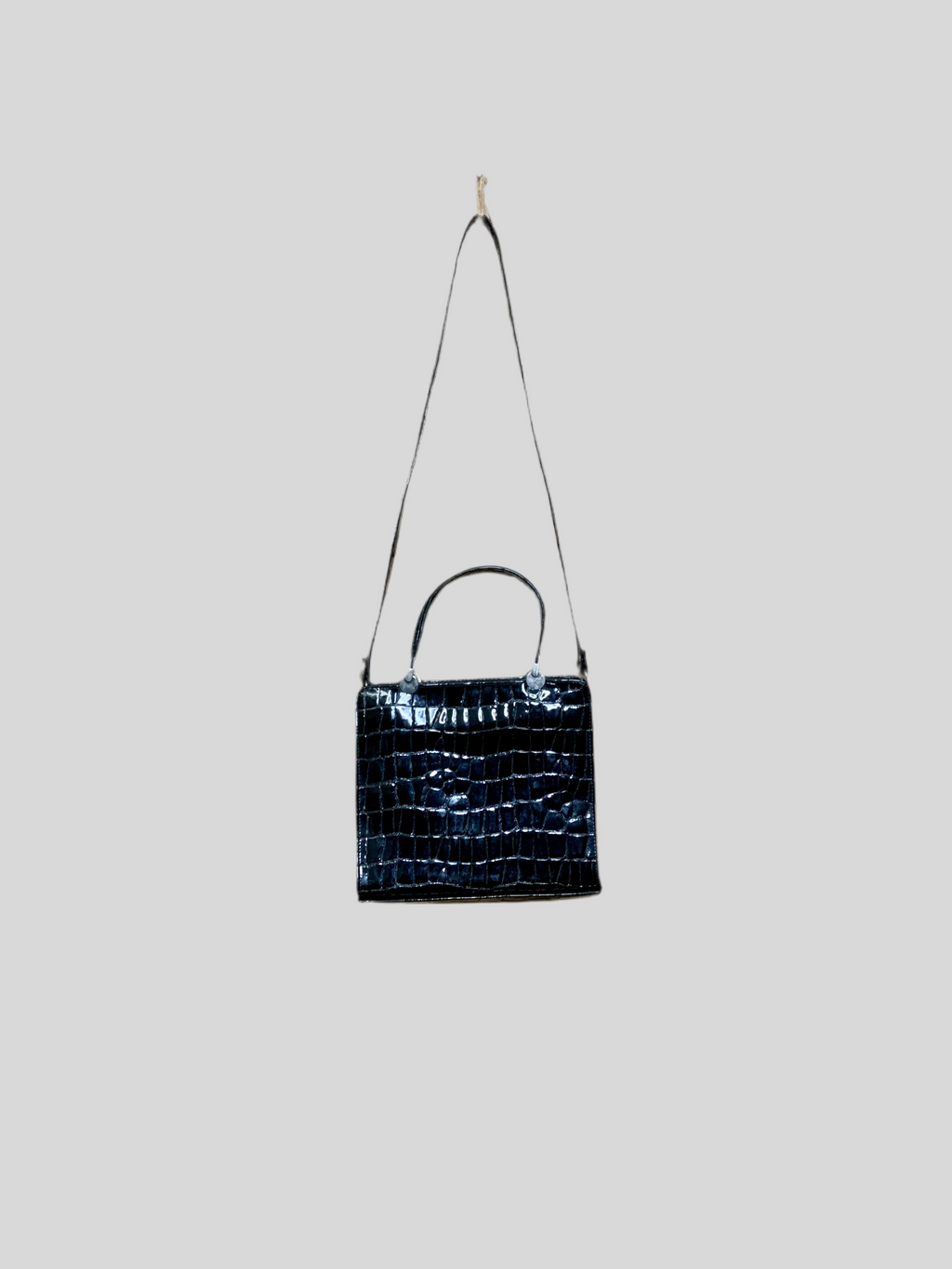Sac à main noir effet croco vernis