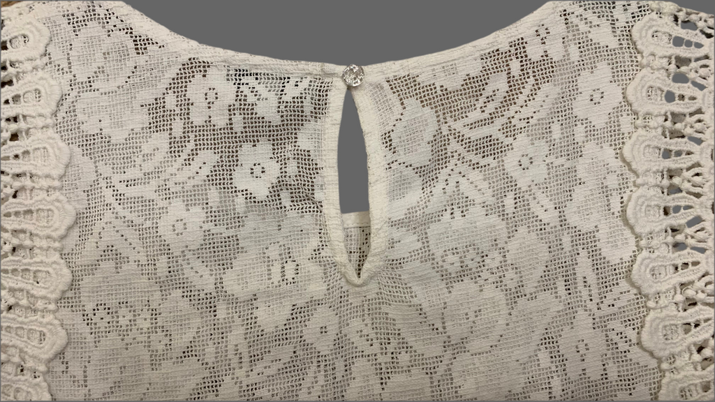 Blouse sans manches en dentelle