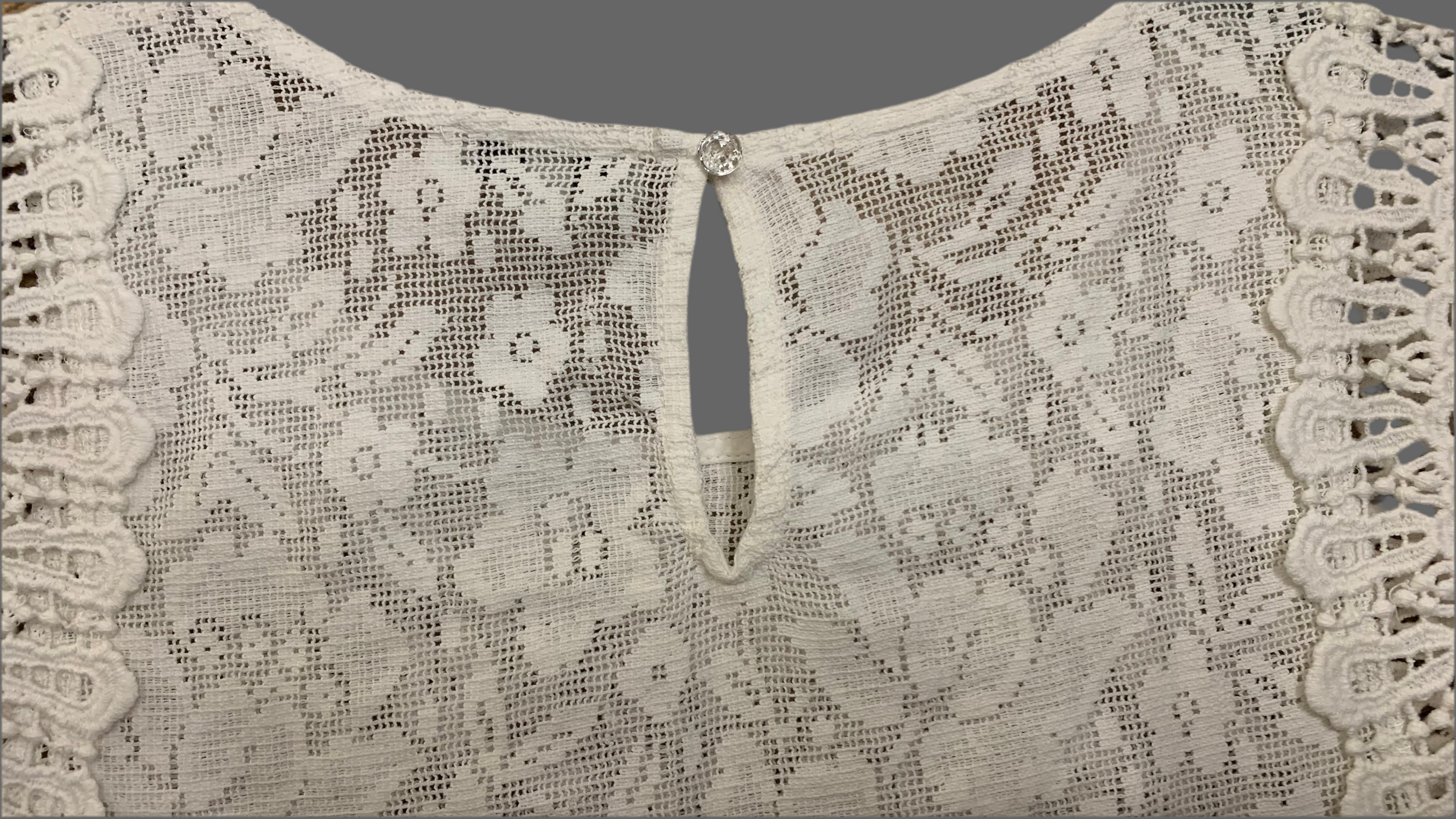 Blouse sans manches en dentelle