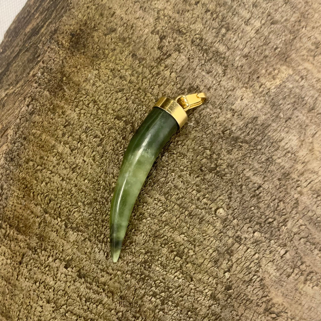 Pendentif Dent de defense