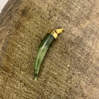 Pendentif Dent de defense